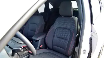 Front car seats, part of a passenger car. The seat where the driver sits.